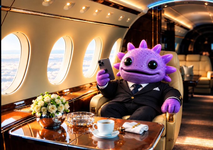 An AI-generated image of a purple axolotl character wearing a suit, sitting in a private jet while holding a smartphone, with a coffee cup, flowers, and snacks on the table beside it.