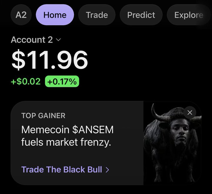 A crypto/trading app screen showing 'Account 2' with a balance of $11.96 (+0.17%), featuring a 'Top Gainer' banner for memecoin $ANSEM.