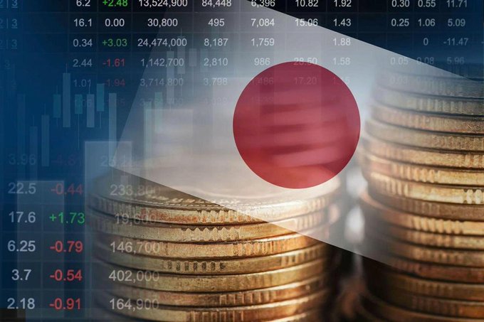 A composite image showing the Japanese flag overlaid on stacks of gold coins and financial market data with red and green price changes and figures such as 233,300, 19,600, 146,700, 402,000, and 164,900.

The visual supports the post by depicting Japan (flag) merging with traditional finance (coin stacks and stock market figures), symbolizing the country's move to integrate blockchain-based token settlement for stocks and government bonds into its existing financial infrastructure.