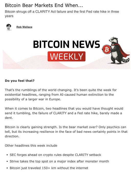 The image is a Bitcoin News Weekly newsletter titled "Bitcoin Bear Markets End When…" with a subtitle noting Bitcoin shrugged off a CLARITY Act failure and the first Fed rate hike in three years, authored by Rob Wallace. It features a "Bitcoin News Weekly" banner with a raccoon mascot in a red cape and discusses Bitcoin's resilience against negative news, along with headlines about the SEC, Strive, and Bitcoin transacting offline over 150+ km, aligning with the post's message about Bitcoin's strength amid adversity.