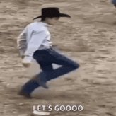 The image shows a person wearing cowboy attire, including a hat, walking across a dirt field with their legs spread out behind them. The caption of the image reads "Let's gooo", which seems to be a reference to the phrase "let's gooo" from the movie "Let's Go". This suggests that the photo might have been taken at an event or gathering related to cowboys, western movies, or a similar theme.
