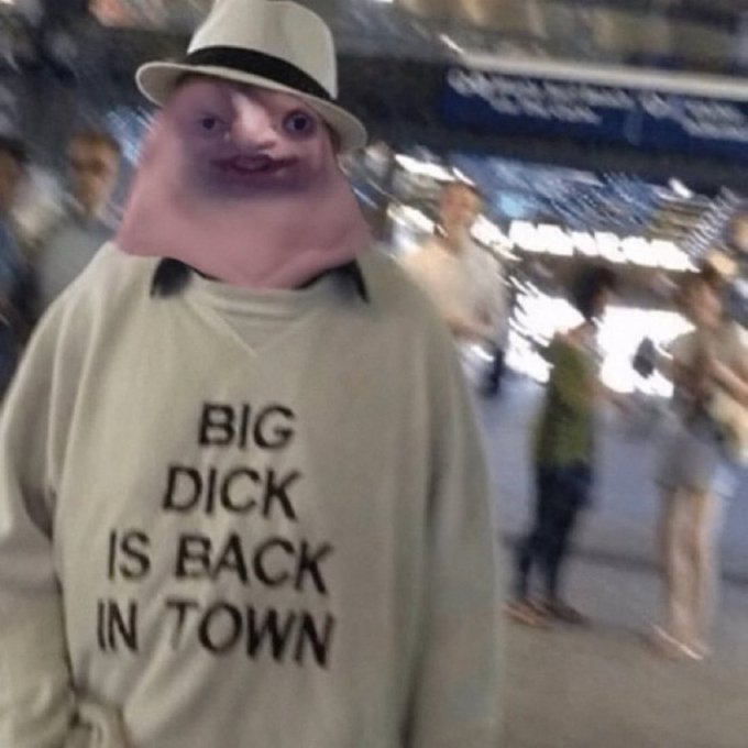 This image features a person wearing a sweater with the text "BIG DICK IS BACK IN TOWN." The post "Back in the Solana trenches" implies this is a reference to a specific event or trend within the Solana cryptocurrency community.