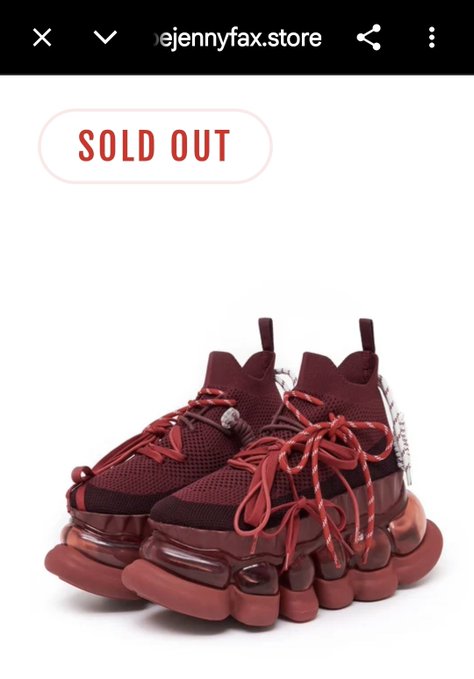 A screenshot from 'jennyfax.store' showing a pair of burgundy red sneakers with chunky air-cushion soles displayed as 'SOLD OUT'.