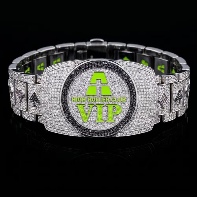 A diamond-encrusted bracelet featuring a central emblem reads "HIGH ROLLER CLUB VIP" in bright green lettering, fitting the luxurious poker tournament theme of the gated BAYC/MAYC ApeChurch event offering high-stakes prizes.