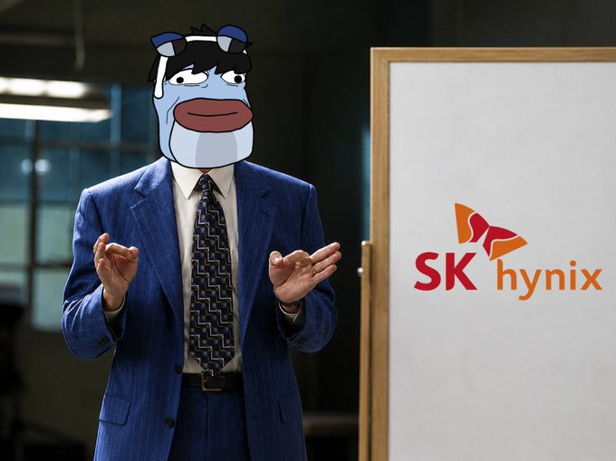 A person in a blue pinstripe suit and tie stands next to a whiteboard displaying the "SK hynix" logo, gesturing with open hands. Their face is obscured by an animated cartoon avatar.
