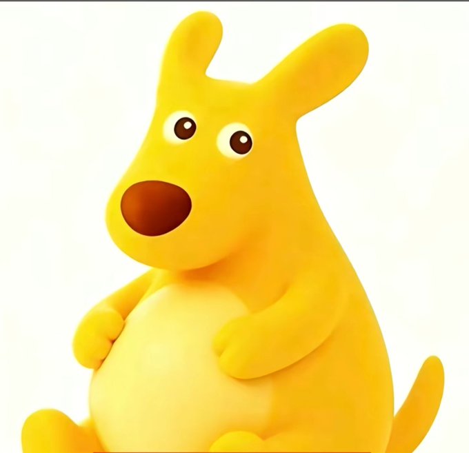 A cheerful 3D-rendered yellow cartoon kangaroo with a large red nose sits against a plain white background.