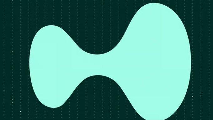 An abstract light teal/peanut-shaped organic design centered on a dark green dotted background.