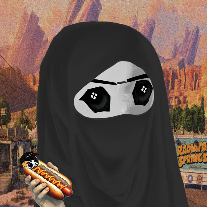 A stylized digital artwork showing a person wearing a black hijab that resembles a mask with large cartoon eyes, holding a hotdog with 'NIGHT' written on it, set against a desert background featuring a 'RADIATOR SPRINGS' sign.