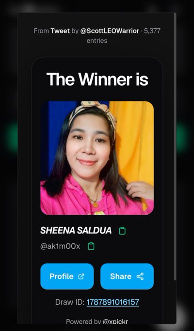 A screenshot of a Twitter giveaway announcement from @ScottLEOWarrior declaring Sheena Saldua (@ak1m00x) as the winner of a draw with 5,377 entries, powered by x0ickr with Draw ID 1787891016157. The image displays her profile photo showing a smiling woman wearing a pink hoodie and patterned headband, matching the accompanying post congratulating the winner.