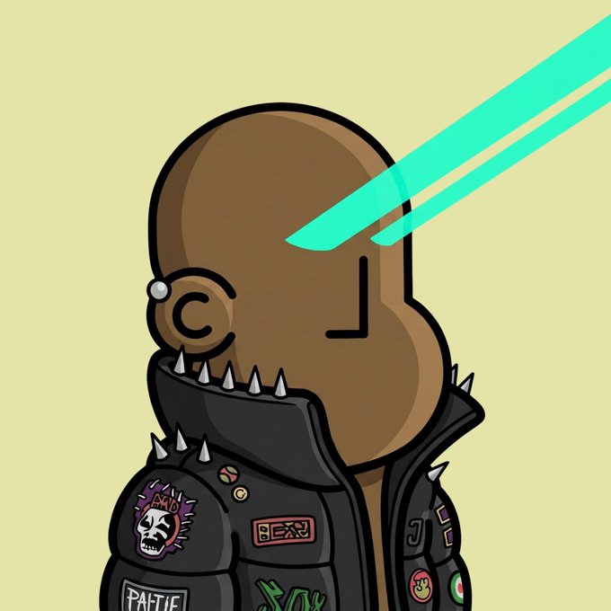 The image features a cartoon character wearing a leather jacket, goggles, and spiky hair. The character has a serious expression as they look directly at the camera. The background of the image is white with green rays coming from above. There are also several stickers on the character's face, including one that says "@npconchain" and another that reads "Glad to be a part of the NPC crew".