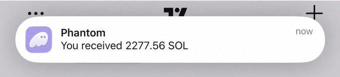A smartphone notification from Phantom wallet reads "You received 2277.56 SOL," which the accompanying post frames as a giveaway, though the timestamp being cropped at the top makes the exact date unclear.