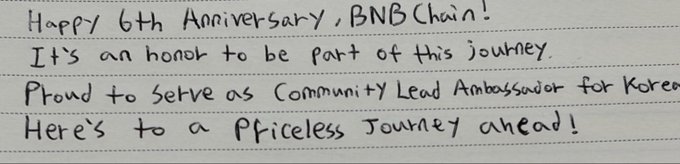 A handwritten note on lined paper congratulating BNB Chain on its 6th anniversary, with the writer acknowledging their role as a Community Lead Ambassador for Korea and expressing pride in serving the community, despite the post's self-deprecating remark about their handwriting.