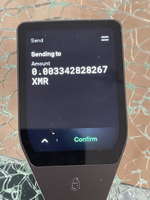 The image shows an electronic device, possibly a phone or tablet, displaying a screen with a message that reads " Send sending to XMR". The device appears to be turned off at this moment. There are no other objects or texts visible on the screen.