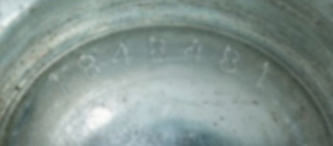 A close-up photograph of the bottom of a metal can, showing stamped text that reads "BABAR" along with a date code, with a bright reflection on the surface.

The image appears unrelated to the #XRP cryptocurrency tag, showing only a generic can stamp rather than anything crypto-related.