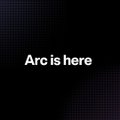 A dark screen with white text reading 'Arc is here'.