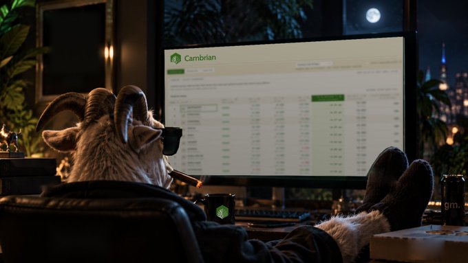 An anthropomorphic goat in pajamas relaxes in a chair with feet up, viewing a Cambrian cryptocurrency exchange chart on a monitor at night.