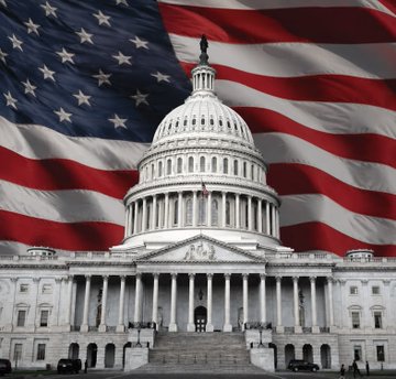 The U.S. Capitol building is shown with the American flag draped in the background. The image relates to the post by symbolizing the Senate's decision to delay the CLARITY Act in favor of a Russia sanctions bill before the August 8 recess.