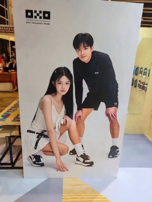 A promotional poster for 'OKO Golf Pickleball Pad' featuring a young man and woman modeling athletic apparel and shoes in a store setting.