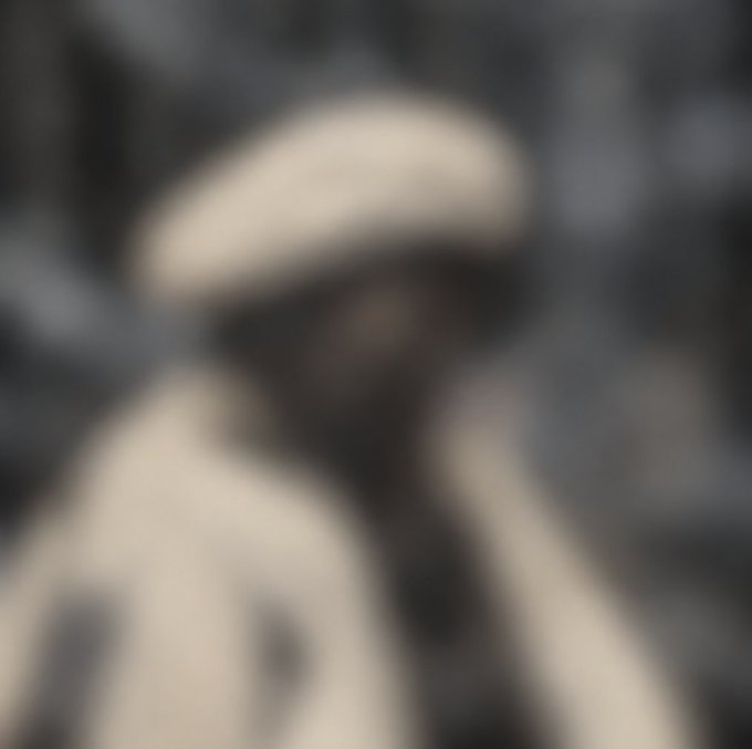 A heavily blurred image of what appears to be a character wearing a white cap and coat, with indistinct facial features, matching the post's note that the "actual final art image" is intentionally blurred. The image serves as a teaser for an upcoming free NFT mint called "Stealth," with details obscured to build anticipation ahead of the 10-hour mint window.