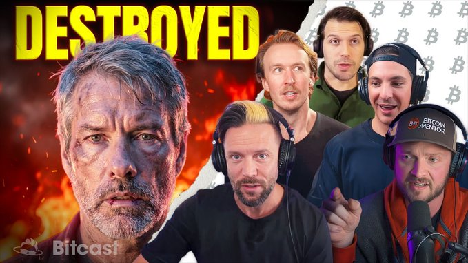 The image features a poster with six men wearing headphones, all of whom are wearing black shirts. The poster also includes text that reads "destroyed" above the group of men. The background of the poster has a fire element, which adds intensity to the overall theme. The caption below the poster states "IF YOU'RE BEARISH ON BITCOIN WATCH THIS! IF YOU'RE BULLISH ON BITCOIN WATCH THIS!".