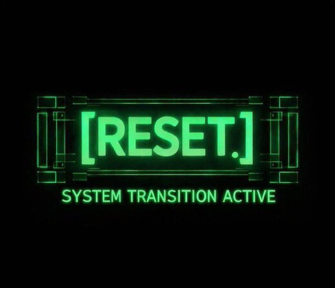 Digital display with glowing green text reading '[RESET.] SYSTEM TRANSITION ACTIVE' on a black background.