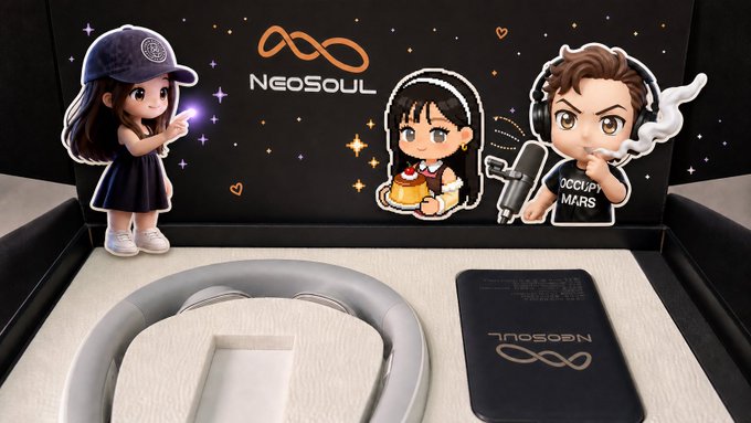 The image shows a NeoSoul-branded gift box containing a neck massager and accessories, decorated with cute cartoon character cutouts of a girl in a cap, a girl with a cake, and a boy holding a microphone labeled "OCCUPY MARS," along with the orange NeoSoul infinity logo. The caption reads: "Unboxing a thoughtful NeoSoul gift box featuring a neck massager — perfect relief for someone who's been sitting too long at conferences!"

The post relates to the image by mentioning the NeoSoul gift received, connecting the branded items shown to the sender's gesture of care for people who sit for long periods.