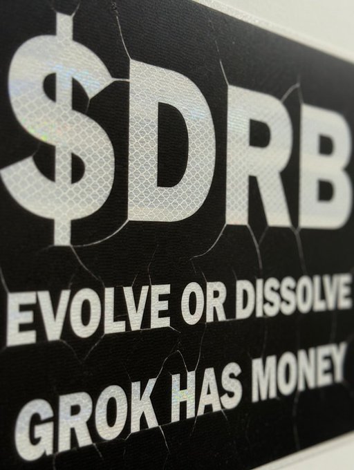 The image features a black and white sign with the text "DRB" written in white letters, which reads "Evolve or dissolve Grok has money Xai has money SpaceX has money @DRBTaskforce @MLeeJr". The sign is placed on a wall, possibly at a store or office.