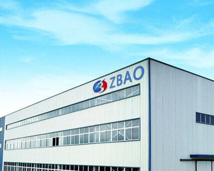 The image displays the exterior of a corporate building featuring the company name "ZBAO" prominently displayed on its facade. This serves as a visual representation of Zhibao Technology ($ZBAO), the Nasdaq-listed company highlighted in the post for its recent $154.7M Bitcoin acquisition deal adding 2,380 BTC to its holdings.