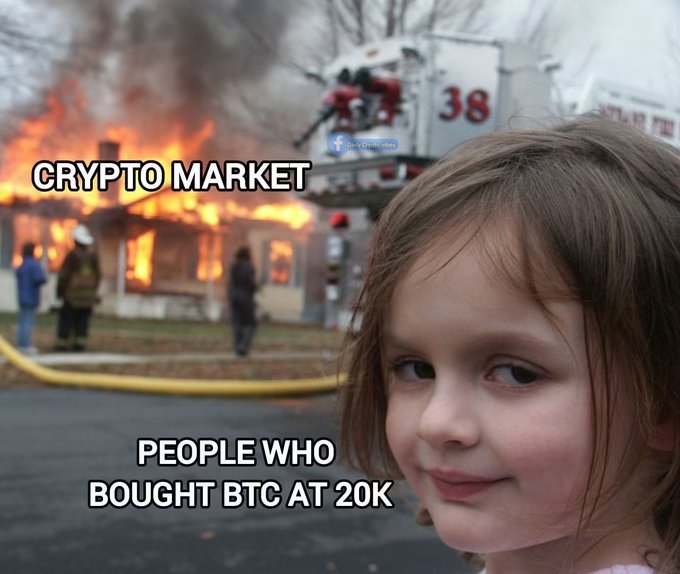 The classic "Disaster Girl" meme has been edited to show a house engulfed in flames labeled "CRYPTO MARKET" with a firetruck numbered 38 in the background, while the girl smirks in the foreground with the caption "PEOPLE WHO BOUGHT BTC AT 20K."