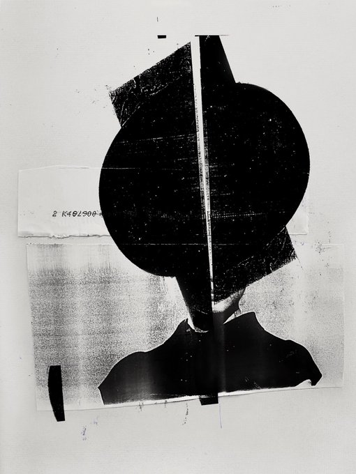 A black-and-white abstract collage featuring dark geometric shapes including a large circle and torn paper elements, with faint text visible reading something like 'K9067642'.