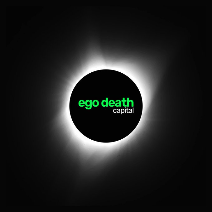 The image depicts a solar eclipse with the text "ego death capital" in green and white at the center. It visually ties to the post celebrating Eclipse Day by using the celestial event as a metaphor for the firm blocking out noise to spotlight Bitcoin-building companies, with $250K–$7M checks ready for standout founders.