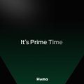 The image features a green triangle with white text that reads "It's prime time" along with an arrow pointing towards the bottom right corner of the image, indicating the direction of the viewer's attention should be towards the bottom right side. The background color is black and there are no other objects or texts in the image apart from the triangle and the arrow.