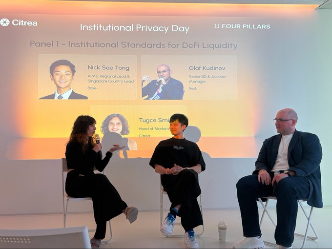 A panel discussion at Citrea's Institutional Privacy Day featuring Nick See Tong (Base) and Olaf Kudinov (1inch) on screen, with three people seated on stage.