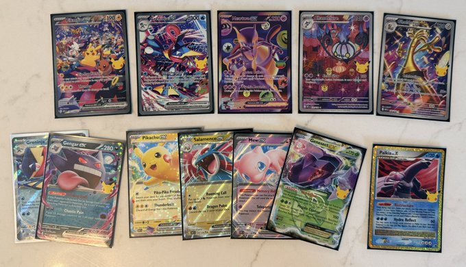 The image showcases a Pokémon TCG collection from the Celestial Storm set, featuring various cards including a Gengar GX #250, Pikachu GX #238, Salazzle GX, Mew, Genesect GX, and Zubat, along with other celestial-themed trainer cards arranged on a marble surface, perfectly capturing the excitement of the "I LOVE THIS SET SOO MUCH!!!!!" sentiment.