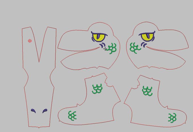 A digital sewing or cutting pattern layout showing outlines of gloves and pants with green decorative symbols and eye motifs on a gray background.