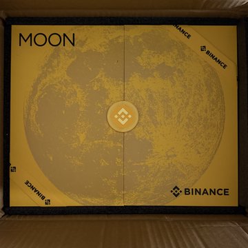 A yellow and gold box labeled 'MOON' and 'BINANCE' displays an image of the moon with the Binance logo in the center.