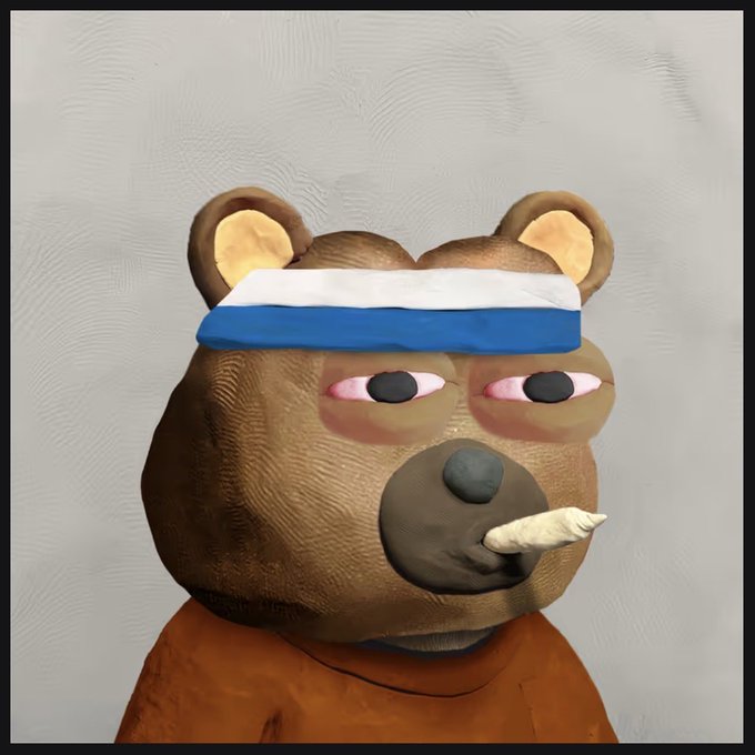 A claymation-style figure of a bear with pink-rimmed eyes wears a white and blue headband and has a small tusk, set against a gray background.