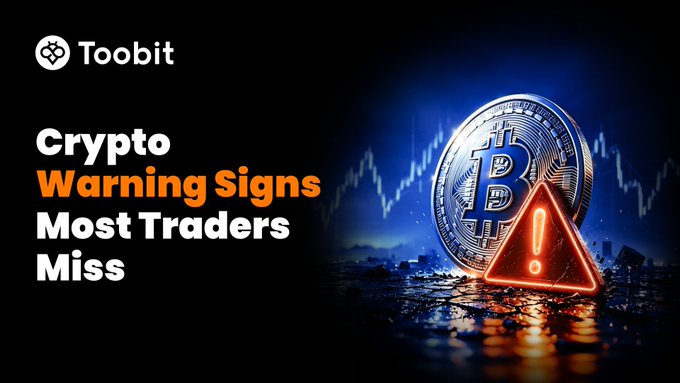 This image features a dramatic composition with a glowing Bitcoin coin and a red warning triangle symbol, overlaid on a market chart and cityscape background, illustrating the "Crypto Warning Signs Most Traders Miss." It complements the post's message about making informed decisions in crypto trading by highlighting common overlooked red flags.

Key text visible: "Toobit," "Crypto Warning Signs Most Traders Miss," with the Bitcoin (₿) logo prominently displayed alongside a warning alert icon.