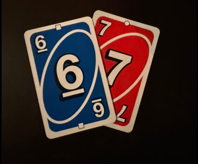 Two UNO cards, a blue 6 and a red 7, are displayed overlapping each other on a dark surface.