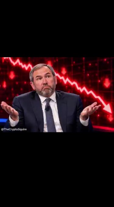 Image showing a suited man shrugging with a puzzled expression in front of a red background featuring a downward-sloping stock chart with arrows and the text '@TheCryptoSquire'.
