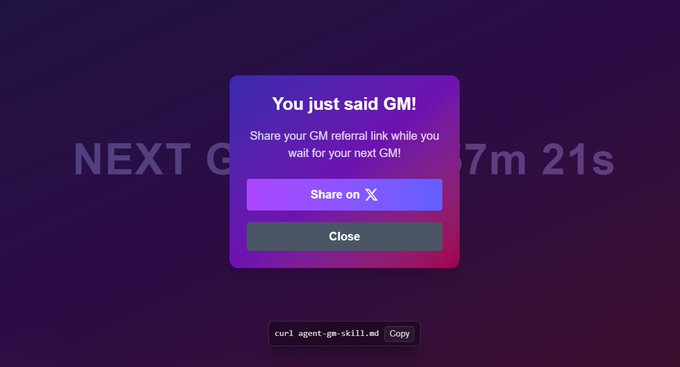 A pop-up dialog box with a purple-to-pink gradient reading "You just said GM! Share your GM referral link while you wait for your next GM!" over a dark background showing "NEXT GM in 57m 21s".