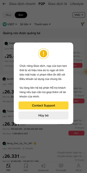 Binance P2P mobile app screenshot in Vietnamese showing a warning popup that 'Giao dịch, nạp rút của bạn tạm thời bị vô hiệu hóa do lo ngại về tình bảo mật hoặc vi phạm tiềm ẩn đối với Điều khoản sử dụng của chúng tôi' with Contact Support and Cancel options.