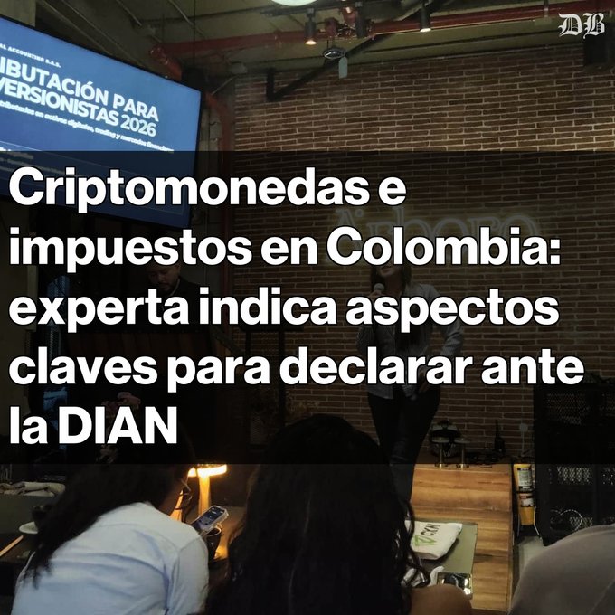 A presentation event about cryptocurrencies and taxes in Colombia, with a large Spanish text overlay reading 'Criptomonedas e impuestos en Colombia: experta indica aspectos claves para declarar ante la DIAN'.