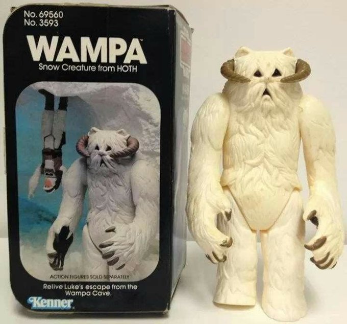 A vintage Kenner Star Wars action figure of the Wampa (No. 69560/3593), the 'Snow Creature from Hoth,' displayed next to its original packaging.