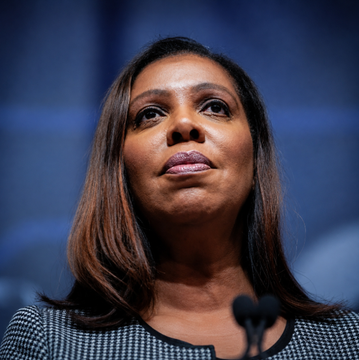 A close-up photograph of New York Attorney General Letitia James speaking at a podium against a blue backdrop.