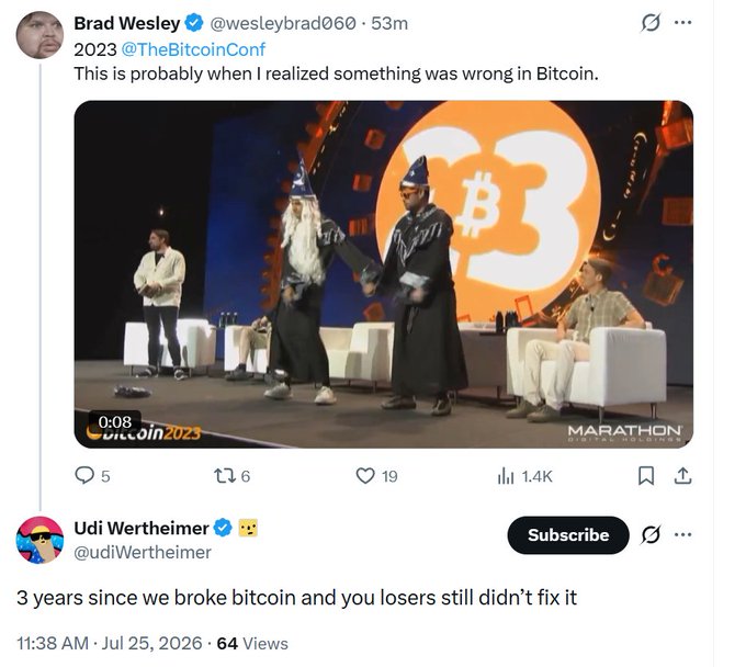 A tweet from Brad Wesley (@wesleybrad060) showing a video still from 2023 @TheBitcoinConf with the caption 'This is probably when I realized something was wrong in Bitcoin,' followed by a reply from Udi Wertheimer (@udiWertheimer) stating '3 years since we broke bitcoin and you losers still didn't fix it.'