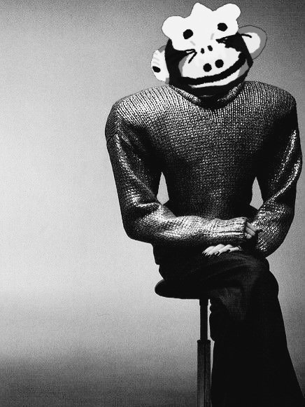 A black-and-white photo shows a person seated on a stool, wearing a metallic chainmail-style top and a distorted monkey mask, symbolizing the satirical view of Bitcoin Core supporters. The caption "If you truly believe in BIP-110, it should be a no-brainer to sell your filthy Corecoins for real Bitcoins" mocks those holding Core coins as ape-like, suggesting they should exchange them for "real" Bitcoin.