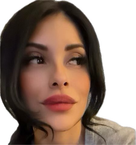 A close-up portrait of a woman with dark hair, red lipstick, and eye makeup looking off to the side.