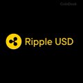 A black screen displays the yellow Ripple USD (RLUSD) logo alongside the text "CoinGecko" in the upper right corner.