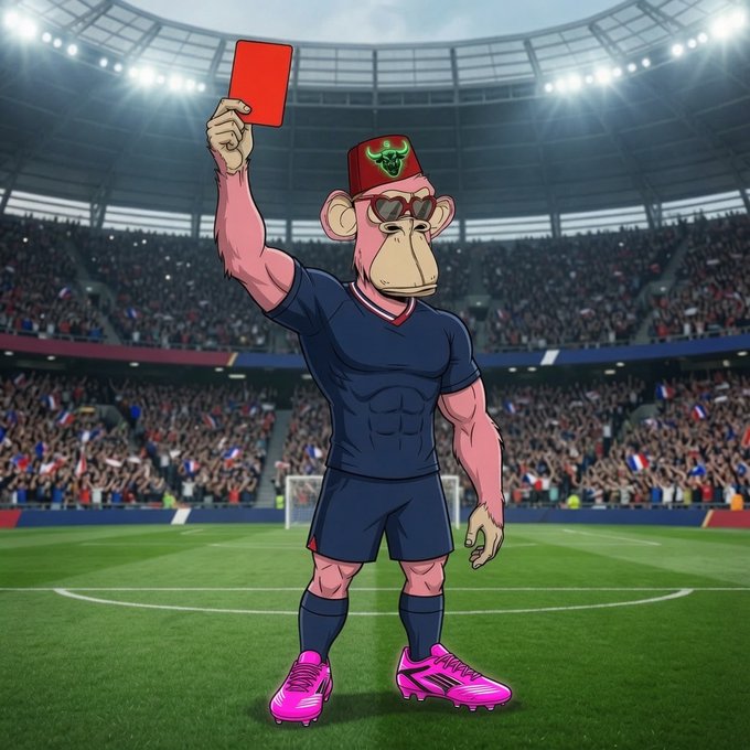 The image shows a muscular cartoon monkey wearing a navy blue soccer uniform, pink cleats, sunglasses, and a red fez hat with a bull emblem, holding up a red card in a stadium. The red card symbolism reinforces the post's message about eliminating anyone who slows down your progress toward your goals.
